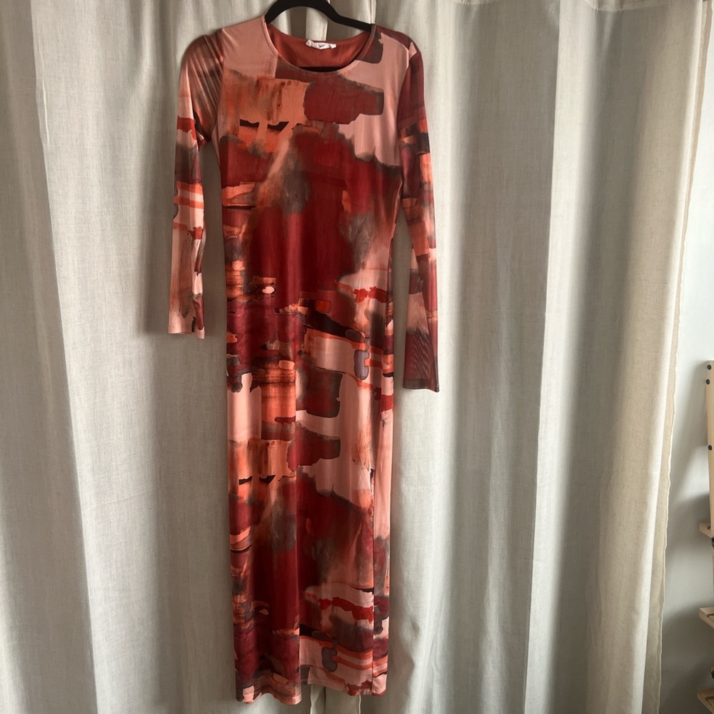 Beautiful 90s dress with mesh long sleeves. Size Medium. Lightly worn.